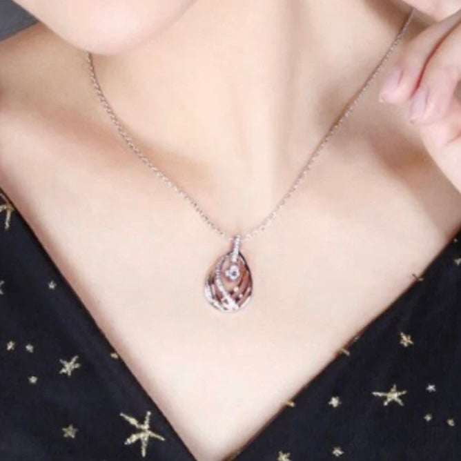 Silver Link Chain with Rose Gold and Silver Braided Pendant and Clear White Cubic Zirconia