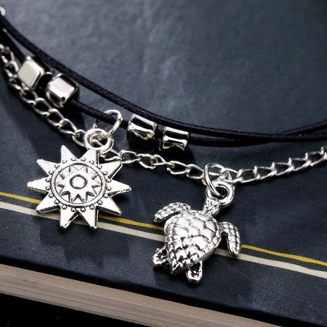 Multilayered Turtle & Sun Charm Anklet bracelet on Silver and Black Rope