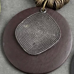 Long Handmade Large Circular Pendant on a Brown Rope Necklace