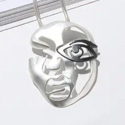 Silver Hollow Face with Black Eye Mask on a Long Silver Necklace