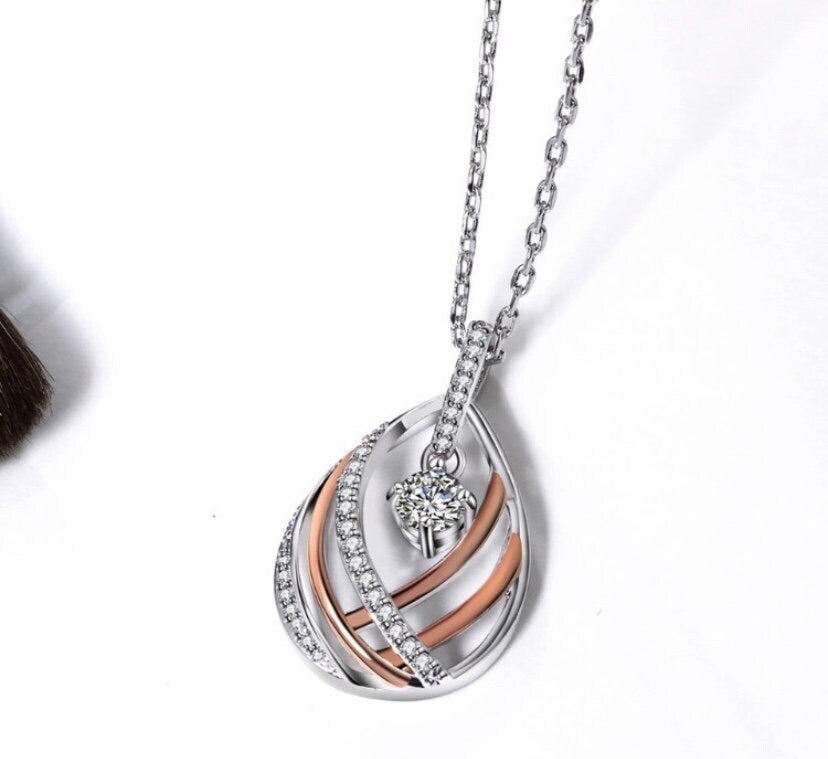 Silver Link Chain with Rose Gold and Silver Braided Pendant and Clear White Cubic Zirconia